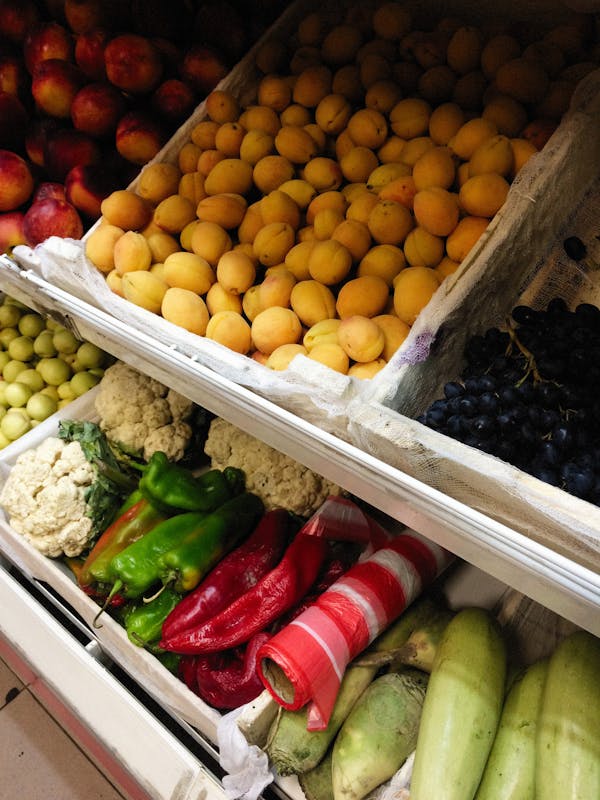 Fresh produce arranged in crates for market supply